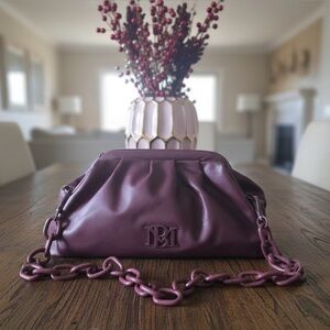 Badgley Mischka Plum Faux Leather Clutch with a removable chain strap NWT
